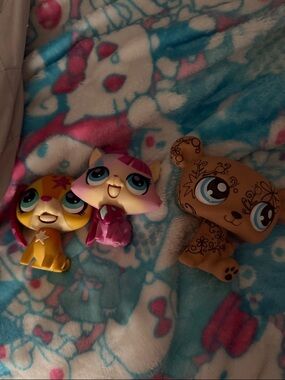 Littlest Pet Shop Yellow, Pink & Brown Trio just displayed.